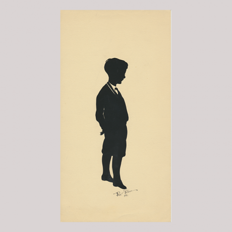 
        Front of silhouette, with boy looking right, in suit.